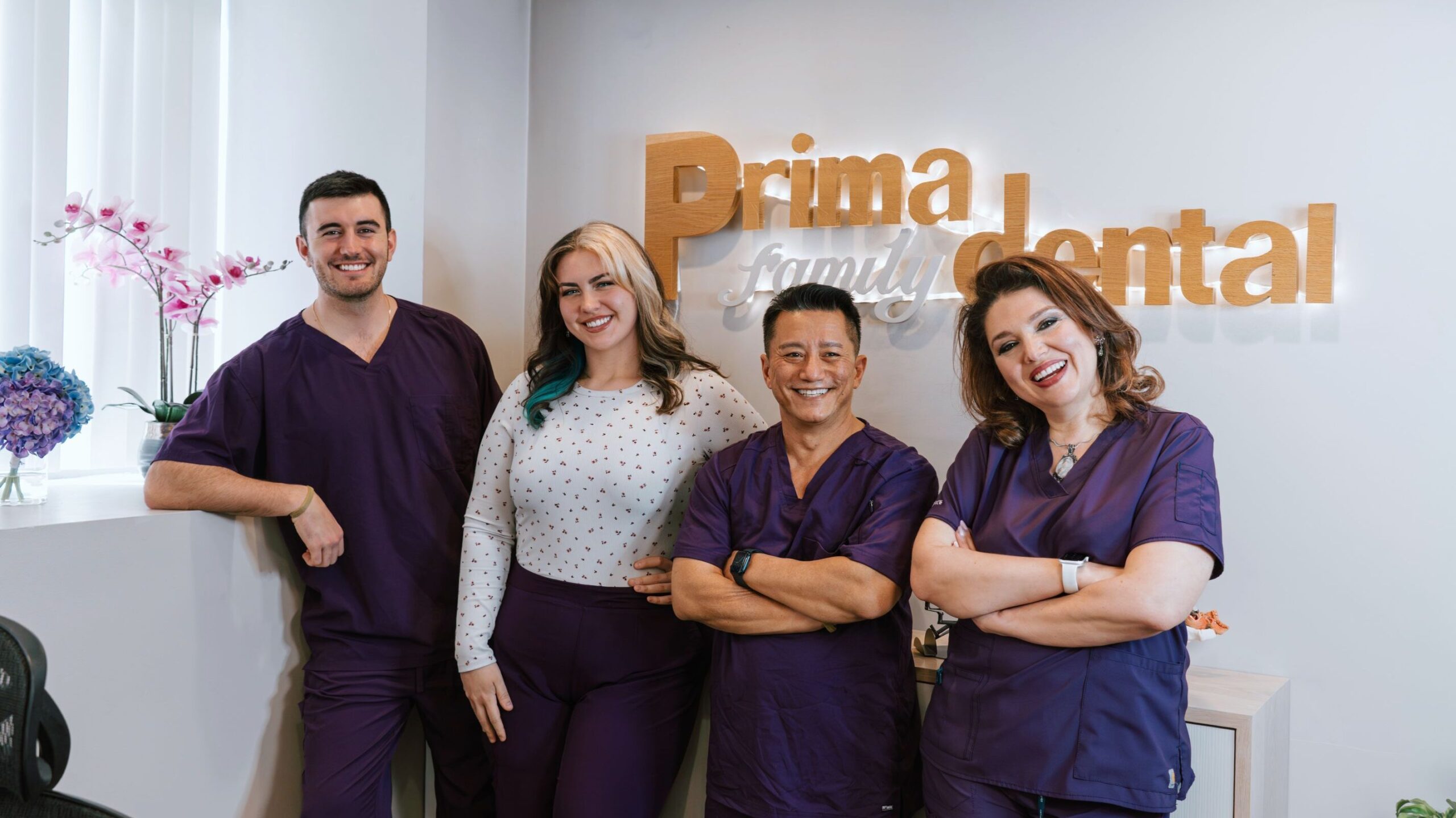 Prima Family Dental team providing Invisalign and comprehensive dental care for adults in Reading, MA.